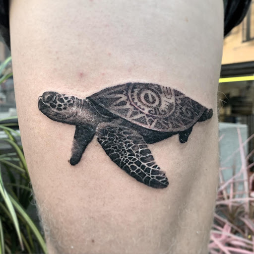 Explore split personality tattoo ideas, creative tattoo ideas in New York, available at Red Baron Ink Tattoo and Piercing