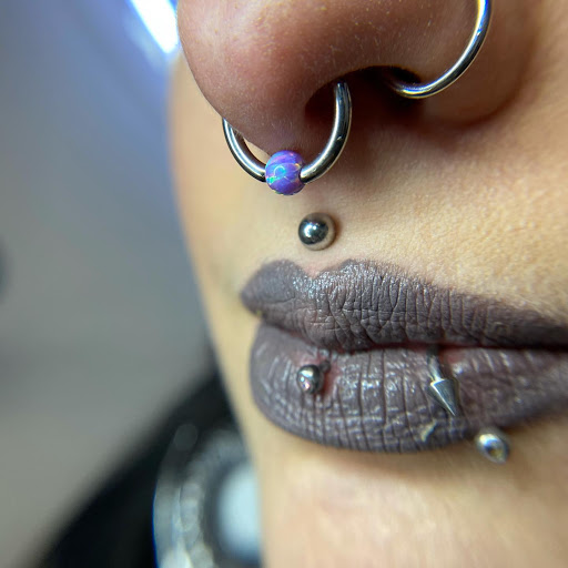 Explore chain link tattoo ideas, creative tattoo ideas in Grand Junction, available at Gemstone Tattoo & Piercing Co.