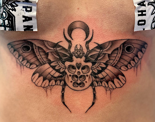 Explore totem pole tattoo ideas, creative tattoo ideas in Honolulu, available at Aloha Tattoo Waikiki Hilton Hawaiian Village Rainbow Bazaar