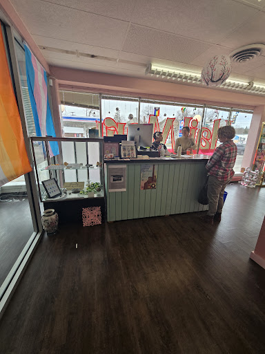 Explore cover up lower back tattoo ideas, creative tattoo ideas in Saint Paul, available at Hail Mary Piercing