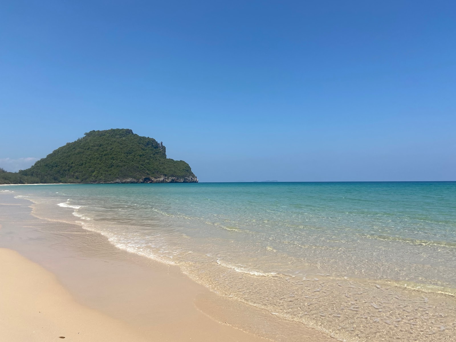Foto de Sandy Beach con arena beige superficie
