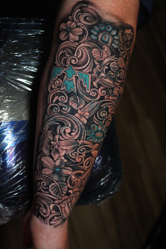 Explore sunflower and roses tattoo ideas, creative tattoo ideas in Homosassa, available at Citrus Tattoos