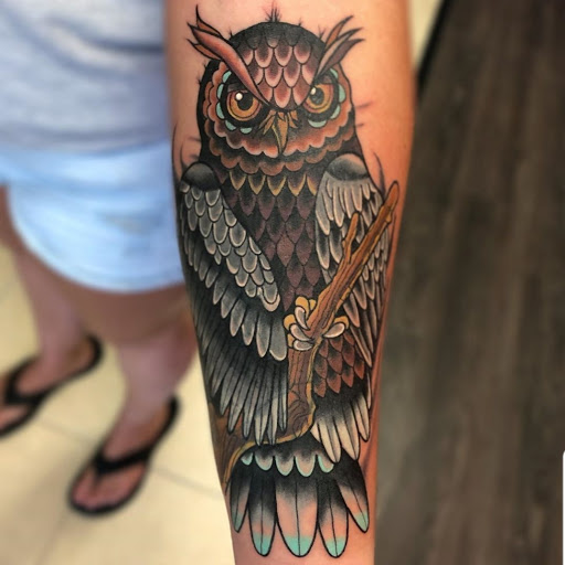 Explore upper back tattoo ideas, creative tattoo ideas in Monroe, available at Vivid Art Tattoos