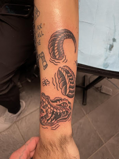 Explore cliff tattoo ideas, creative tattoo ideas in Rapid City, available at Torch Lake Ink