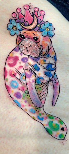 Explore 2002 tattoo ideas, creative tattoo ideas in Benton, available at Spectrum Tattoo