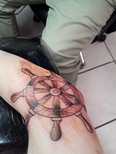 Tattoo Shop «The Divine Canvas Tattoos, Photography and Fine Art», reviews and photos, 1921 E Colonial Dr, Orlando, FL 32803, USA