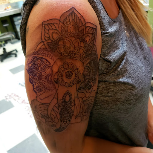 Explore tooled leather tattoo ideas, creative tattoo ideas in Garden Grove, available at Saints & Sinners Tattoo