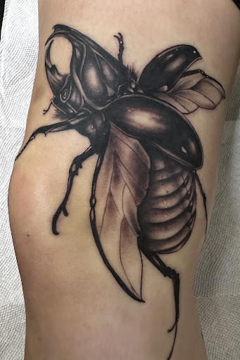 Explore gamble tattoo ideas, creative tattoo ideas in North Charleston, available at Blu Gorilla Tattoo