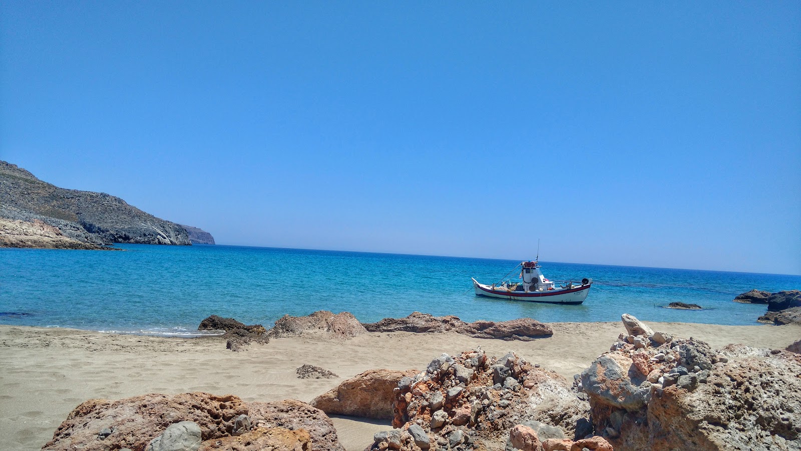 Photo of Mafromouri beach with turquoise pure water surface