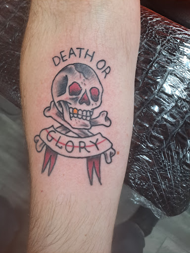 Explore skull tattoo sleeve ideas, creative tattoo ideas in Kansas City, available at Working Class Tattoo