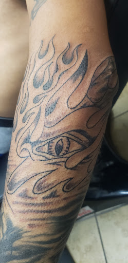 Explore female thigh tattoo ideas, creative tattoo ideas in Oakland, available at Dougs Tattoos
