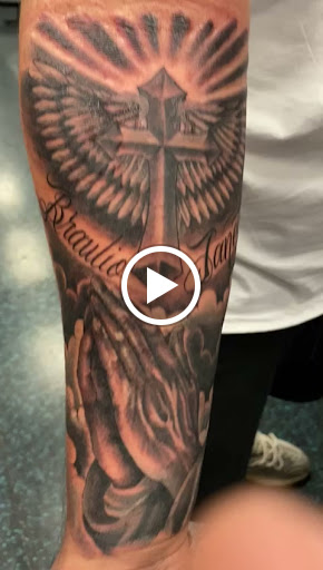 Explore last name back tattoo ideas, creative tattoo ideas in Phoenix, available at Legacy Ink