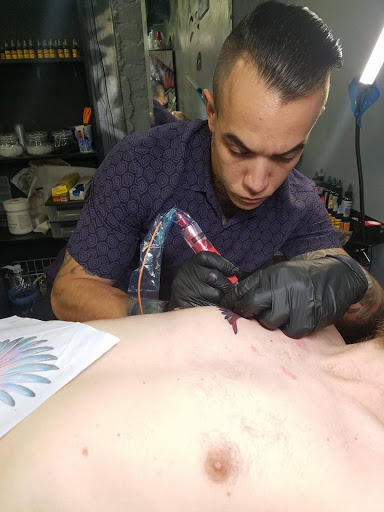 Explore colorful sleeve tattoo ideas, creative tattoo ideas in Mebane, available at The Cardinal Skin Art & Gallery