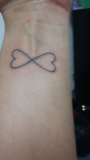 Explore cat and dog tattoo ideas, creative tattoo ideas in Arlington, available at Arlington Ink