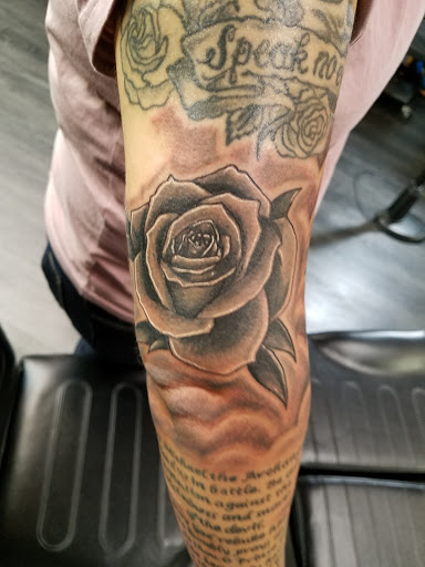 Explore mom and dad tattoos ideas, creative tattoo ideas in Prince Frederick, available at Red Octopus Tattoos