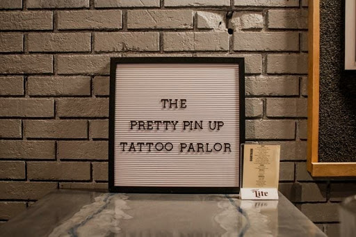 Explore simple spine tattoo ideas, creative tattoo ideas in Batavia, available at The Pretty Pin-Up Tattoo Parlor