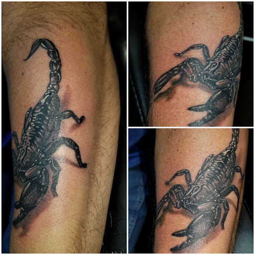 Explore kratos tattoo ideas, creative tattoo ideas in Angola, available at Hoodlum Ink