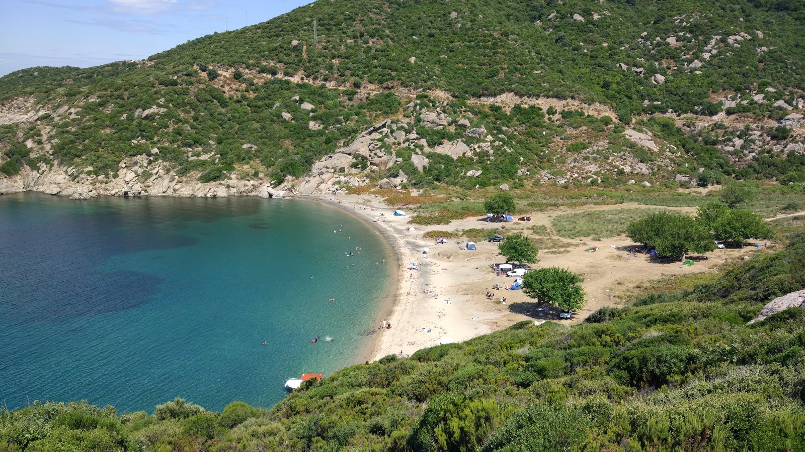 Photo of Kucukova Bay beach with turquoise pure water surface