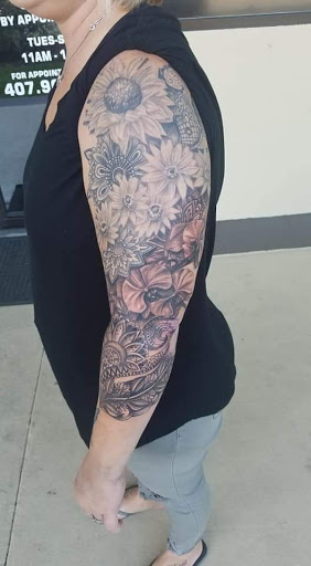 Explore tattoo scar cover up ideas, creative tattoo ideas in Ocoee, available at Slaughterized Ink Tattoo and Piercing Studio