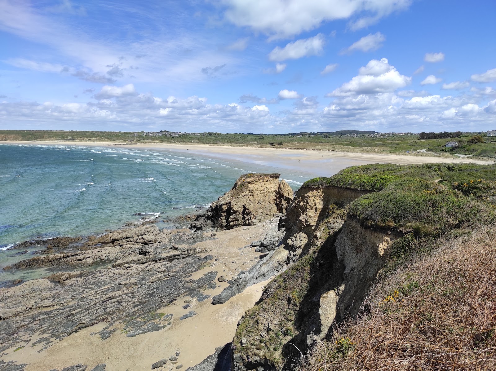 Foto di Plage de Kersiguenou con una superficie del sabbia beige