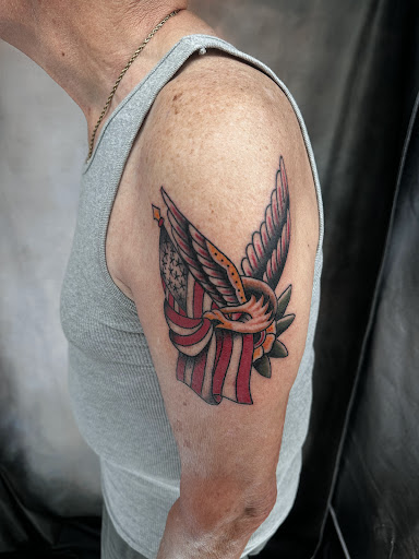 Explore thigh tattoo ideas for females, creative tattoo ideas in Marietta, available at The Queen Bee Tattoo and Piercing Parlour