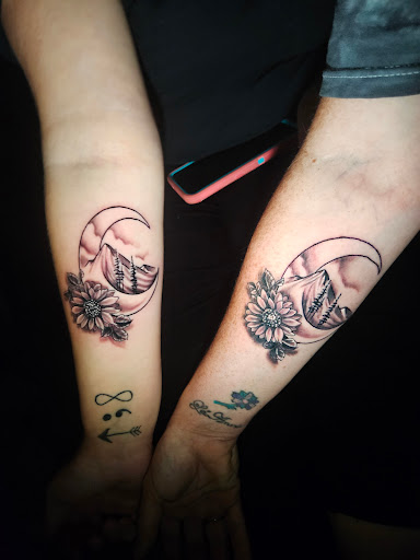 Explore templar tattoo ideas, creative tattoo ideas in Angola, available at Hoodlum Ink