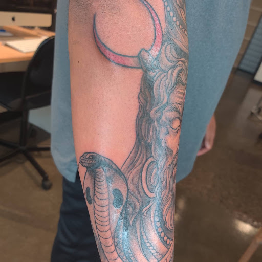 Explore side face tattoo ideas, creative tattoo ideas in Minneapolis, available at Peregrine Tattoo