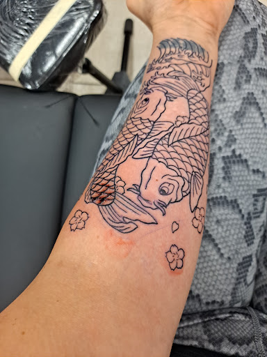 Explore good first tattoo ideas for men, creative tattoo ideas in Katy, available at Artistic Impressions Tattoo Studio