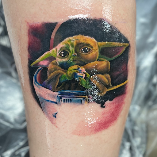 Find tattoo ideas for the back for your next unique tattoo in Huntington at Golden Dagger Tattoos and Piercings