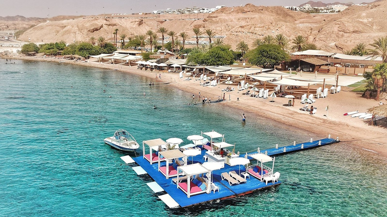 Foto af HaDeqel Beach med let sand og småsten overflade