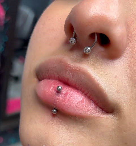 Explore mens upper back tattoo ideas, creative tattoo ideas in Miami, available at Asere My Piercing