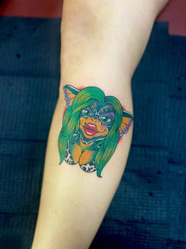 Explore postage stamp tattoo ideas, creative tattoo ideas in Ocala, available at Cobra Classic Tattoo