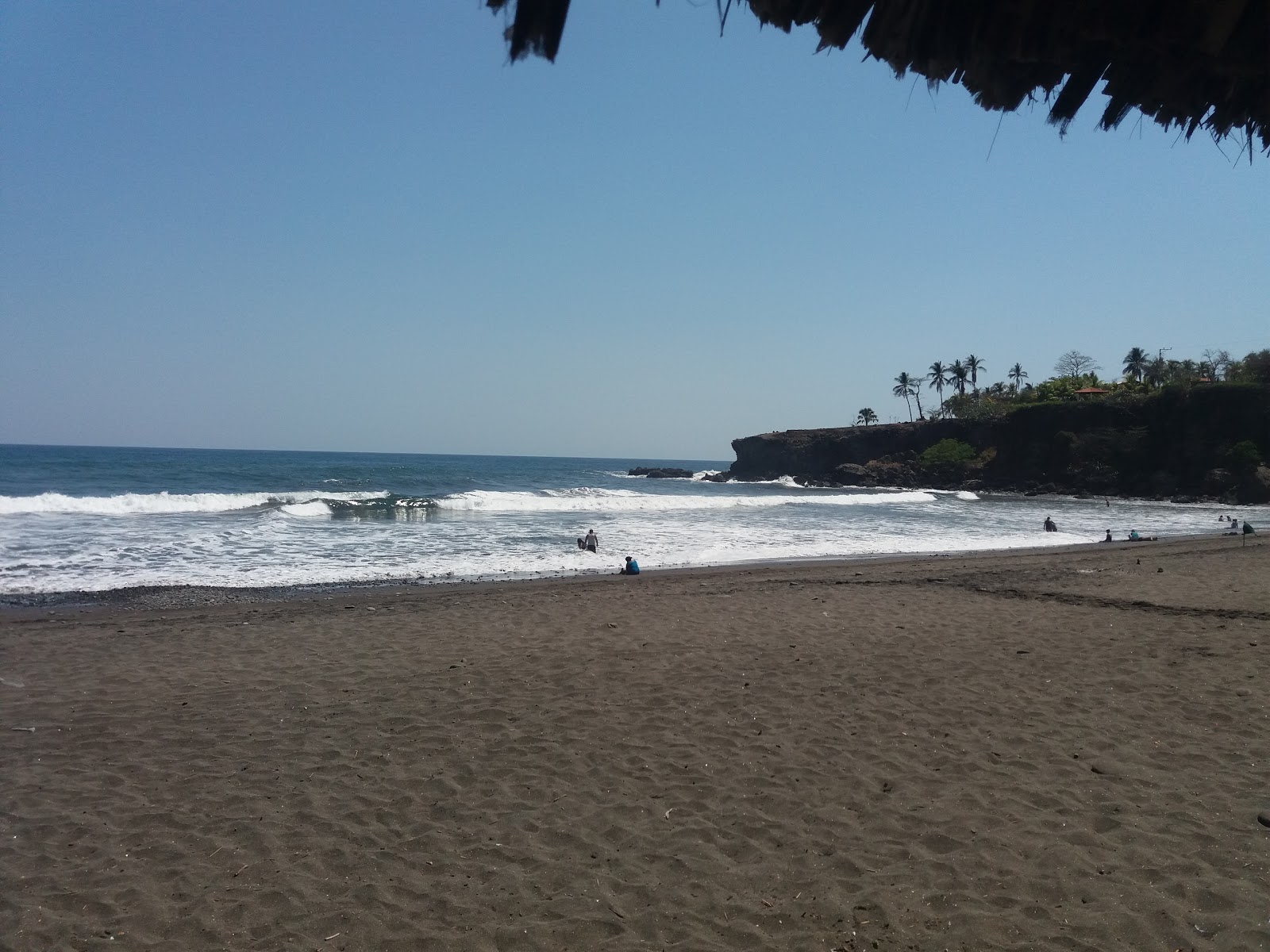 El Palmarcito Beach的照片 带有蓝色纯水表面