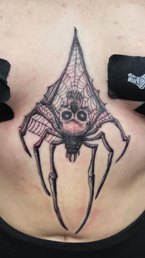 Find spinal cord tattoos ideas for your next unique tattoo in Lewiston at Walkins tattoos studio