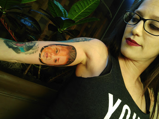 Explore divine tattoo ideas, creative tattoo ideas in Groves, available at Billet Tattoo Studio