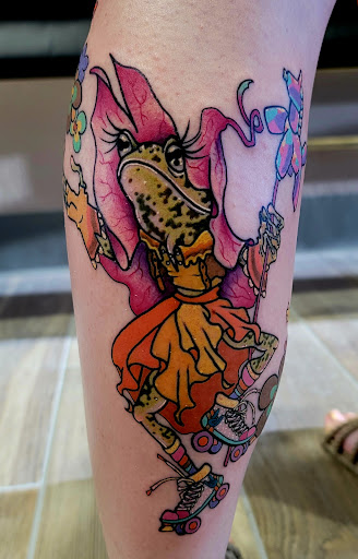 Explore bookish tattoo ideas, creative tattoo ideas in Davis, available at The Vintage Wolf Tattoo Studio