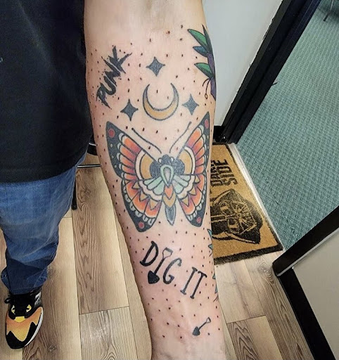 Find christmas tattoo ideas for your next unique tattoo in Alamosa at The Shop Tattoo & Comics