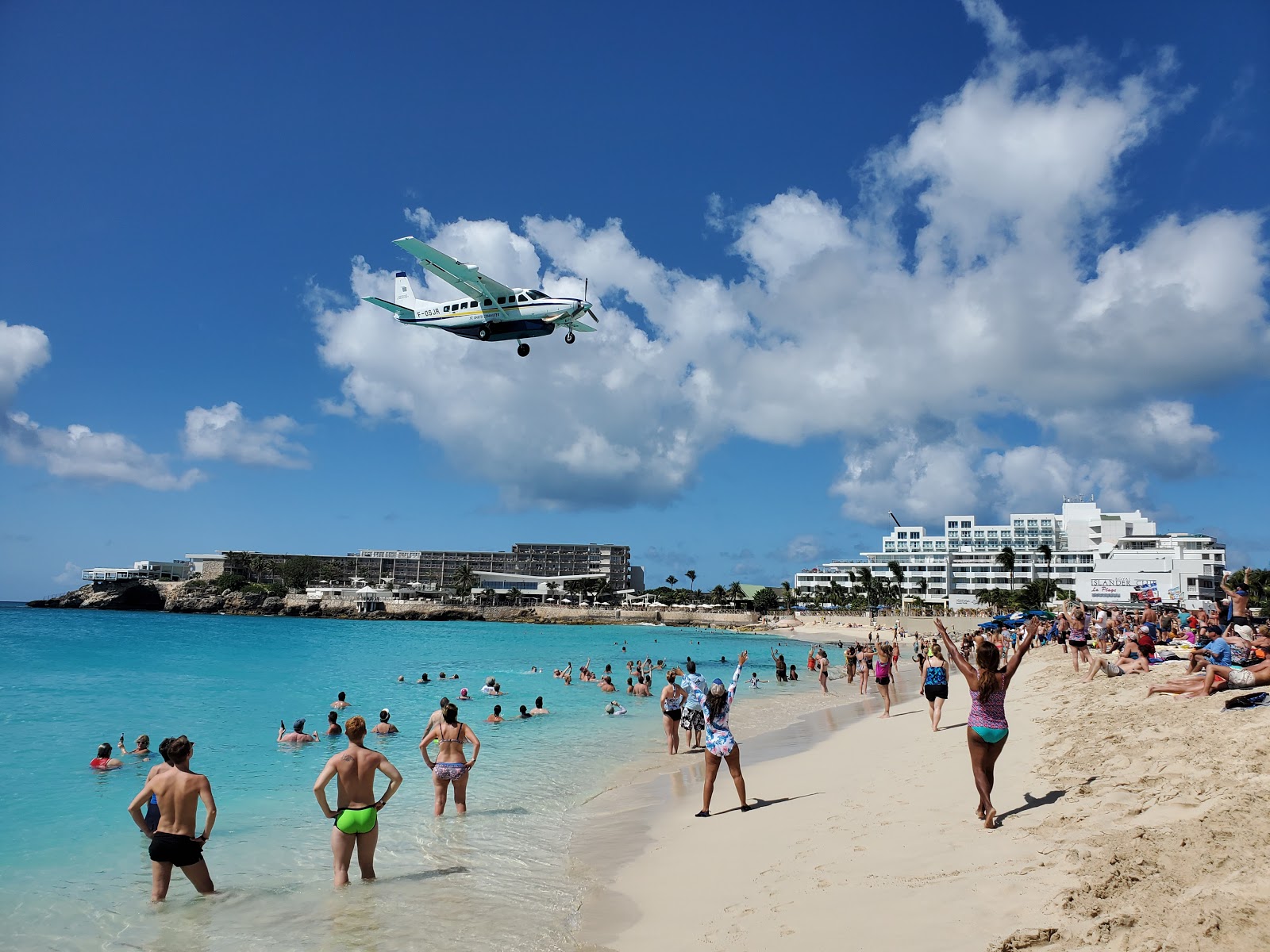 Photo of Maho beach with turquoise pure water surface