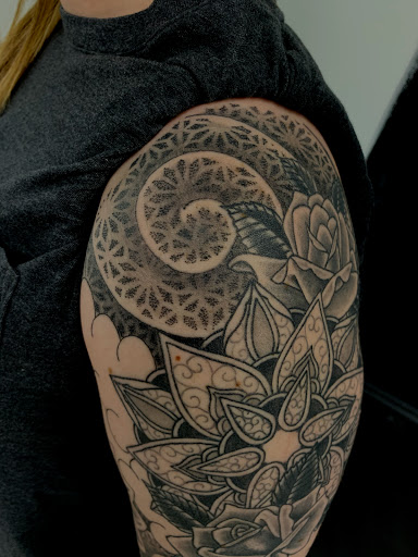 Explore motherhood tattoo ideas, creative tattoo ideas in Mount Clemens, available at Hand & Heart Tattoo