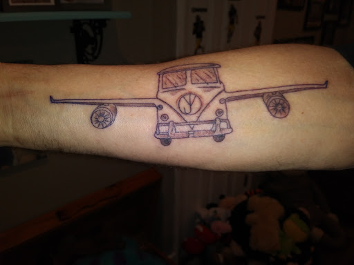 Explore hunting tattoo ideas for guys, creative tattoo ideas in Overland Park, available at Inkslingers Tattoo Studio