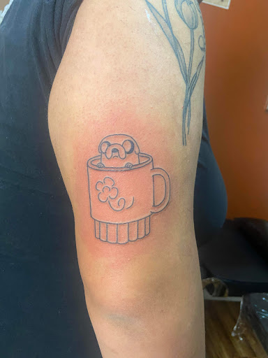 Explore dark romance book tattoo ideas, creative tattoo ideas in Anniston, available at Lucid Dreams Tattoos and Piercings