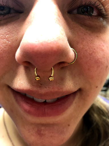 Find in between breast tattoo ideas for your next unique tattoo in Greensburg at House of Ink Inc.