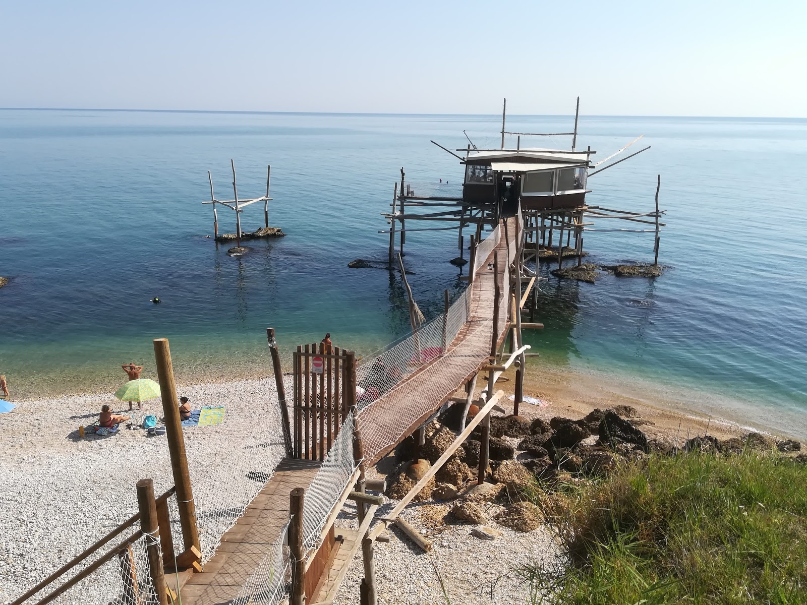 Foto van Spiaggia di Ripari Bardella met blauw puur water oppervlakte