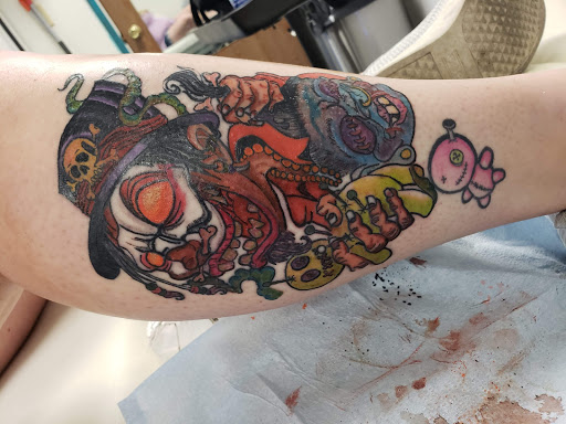 Explore curious george tattoo ideas, creative tattoo ideas in Clarkston, available at Koby Hardy Piercing & Tattoo