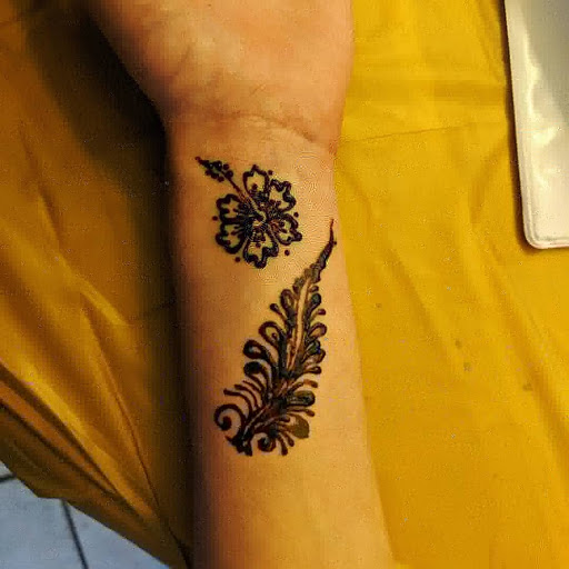 Explore billiards tattoo ideas, creative tattoo ideas in Concord, available at Naseera Fazil Henna Art
