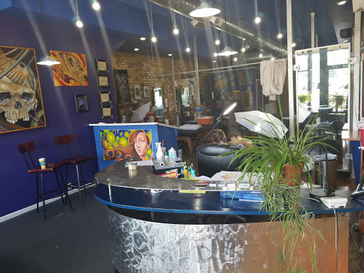 Tattoo Shop «Eclectic Art Tattoo Gallery», reviews and photos, 615 E Michigan Ave, Lansing, MI 48912, USA