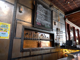 A row of beer taps