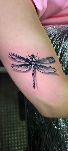 Explore forearm name tattoo ideas, creative tattoo ideas in Angola, available at Hoodlum Ink