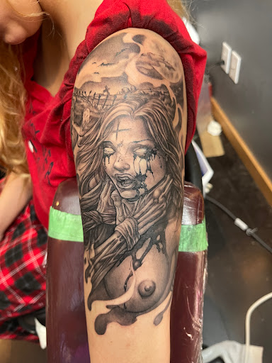 Explore marriage ring tattoo ideas, creative tattoo ideas in Des Moines, available at Skin Kitchen Tattoo