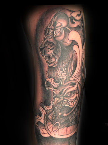 Explore gory tattoo ideas, creative tattoo ideas in Buford, available at Wild Tribe Tattoos and Piercings